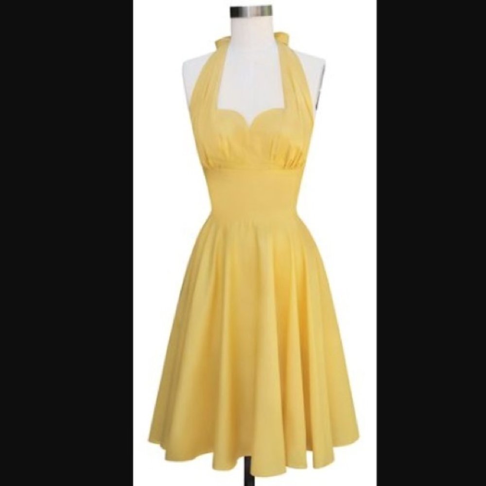 nWOT trashy diva yellow varga halter dress.  ON SALE FOR NEXT FEW DAYS